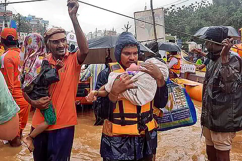 Flood in Vijayawada: SDRF men rescue flood-hit people, in Ajit Singh Nagar
